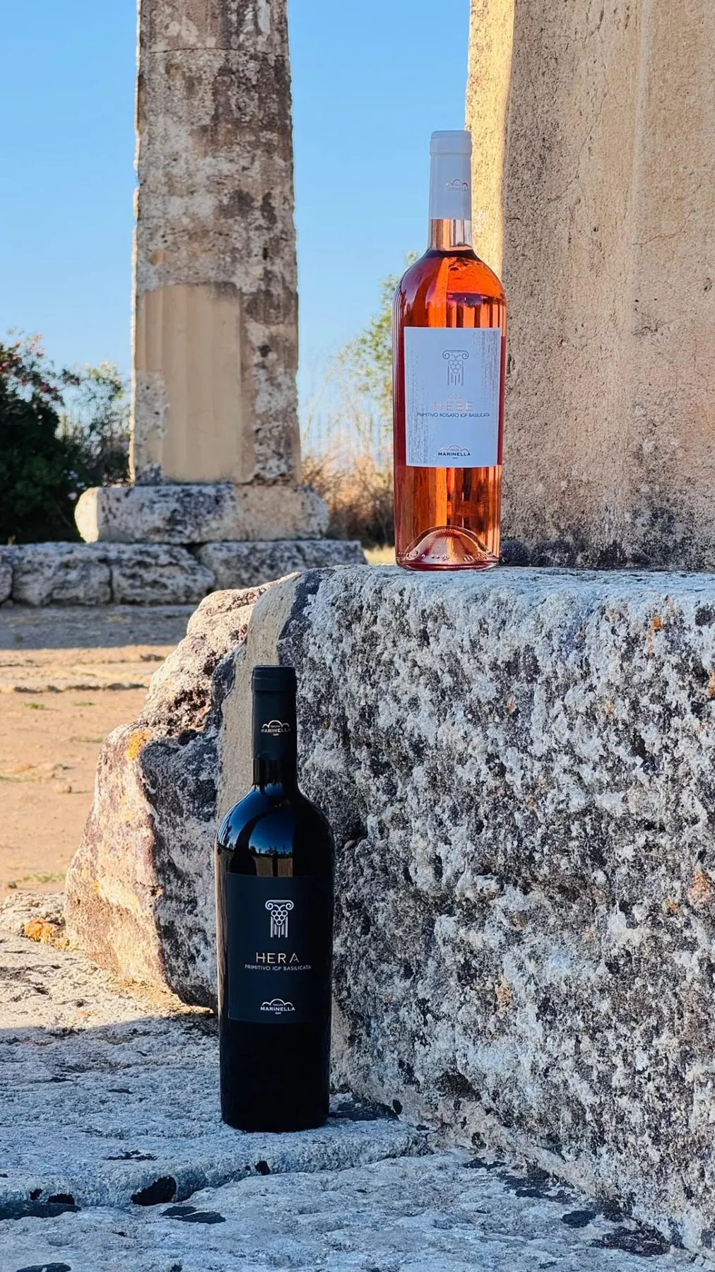 Both bottles at the ancient temple columns